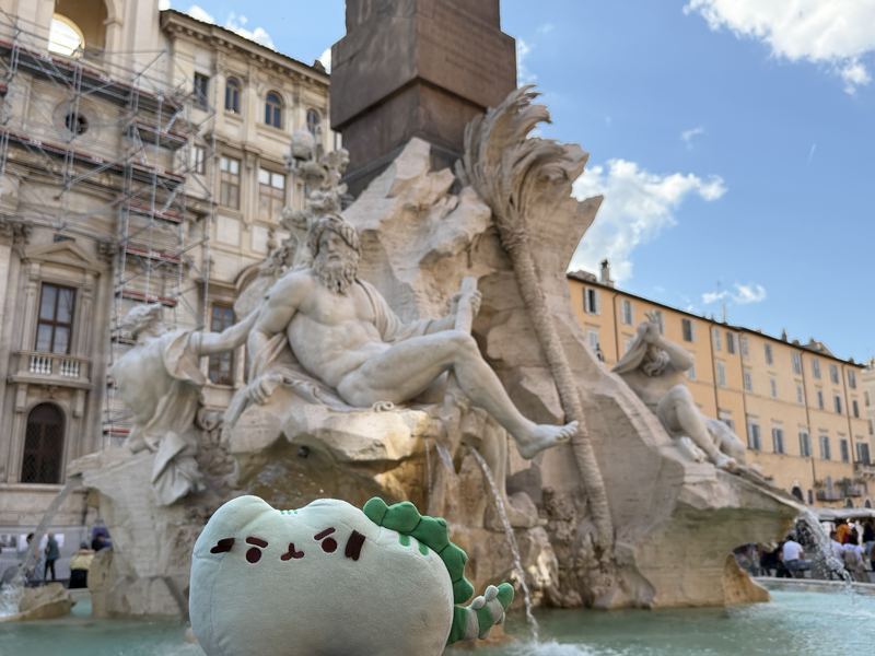 Pusheeno at the edge of the Fountain of the Four Rivers in Piazza Navona, Rome